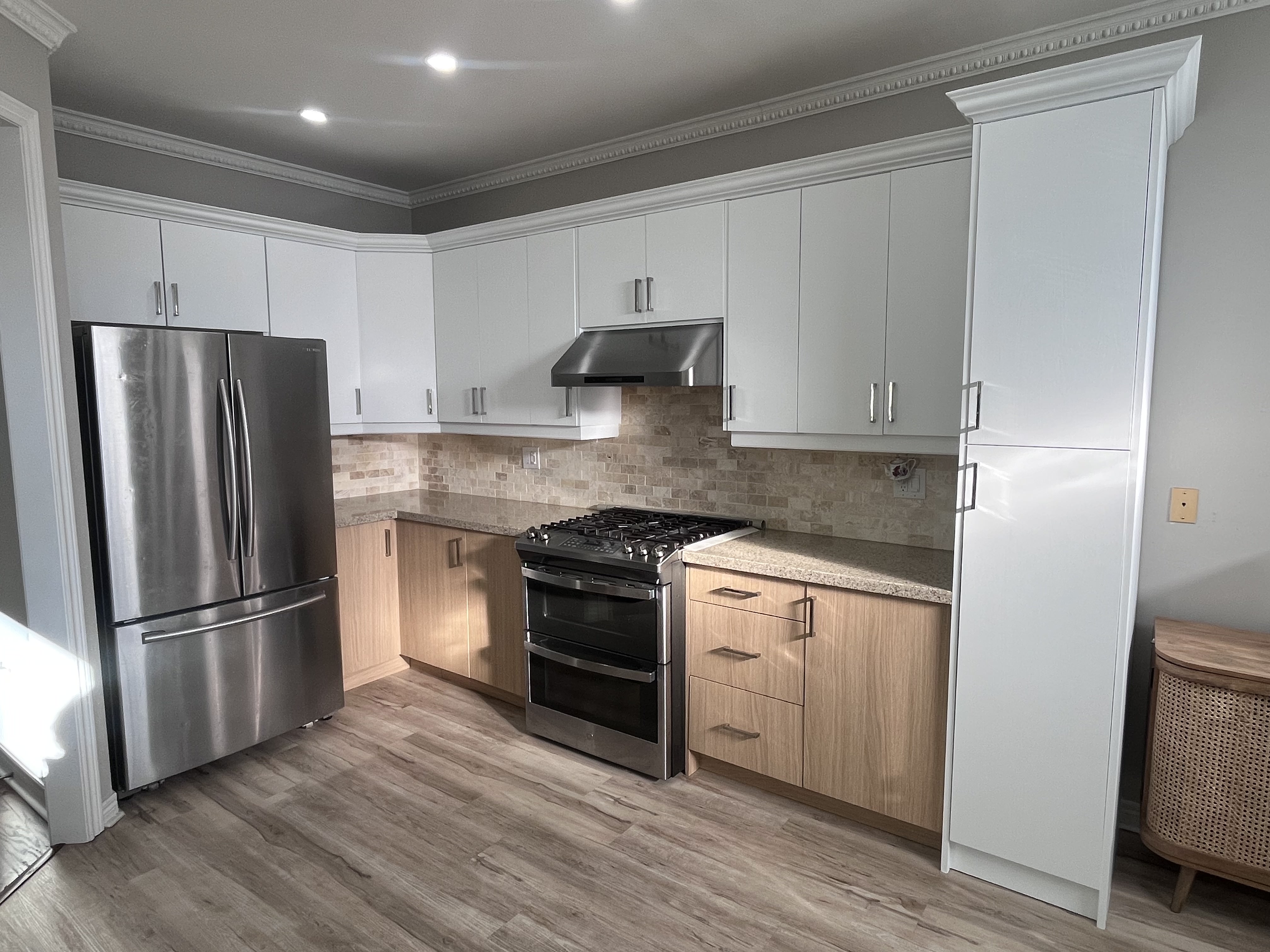 AFTER: Two-Tone Kitchen Cabinets Wrapped in Modern Wood Finish