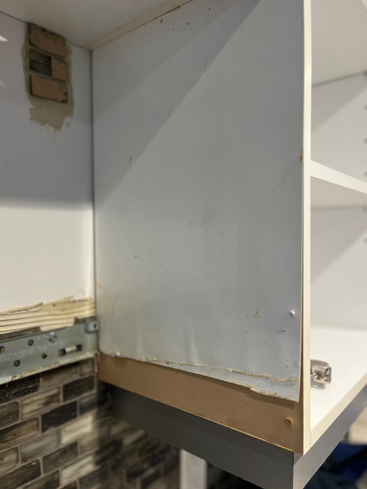 BEFORE: Damaged Cabinet Interior