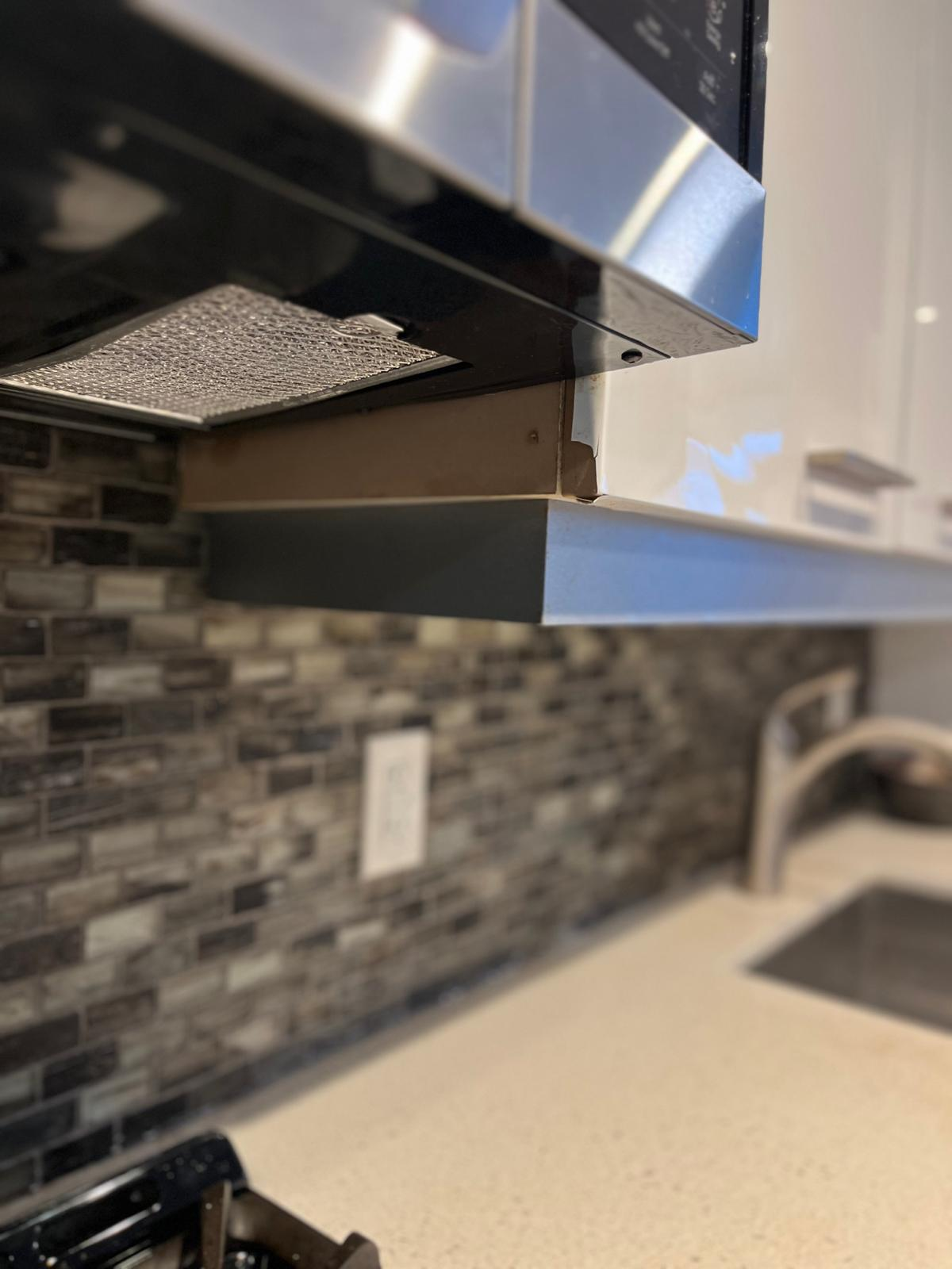 BEFORE: Cabinet Surface Damage