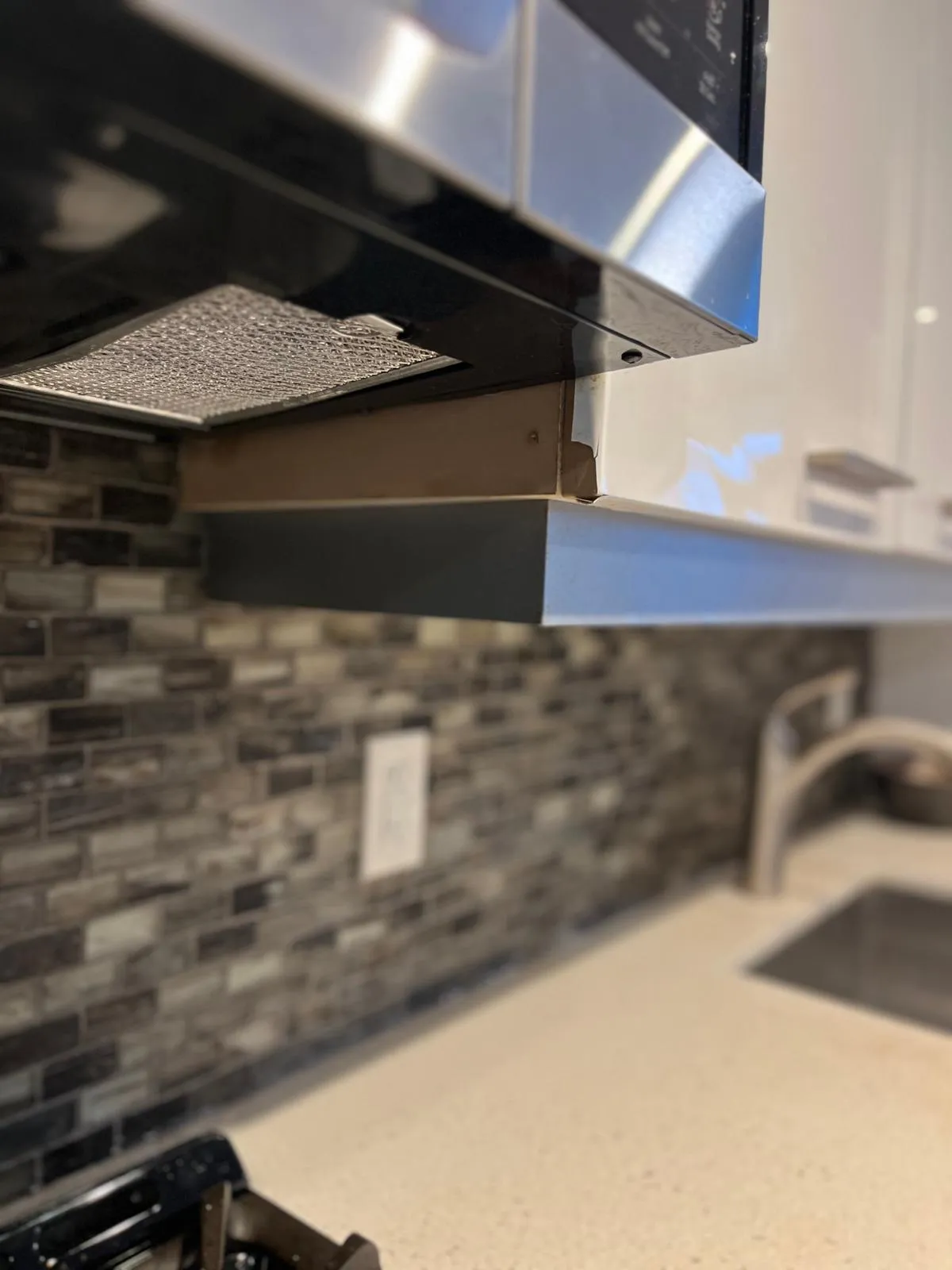 BEFORE: Cabinet Surface Damage
