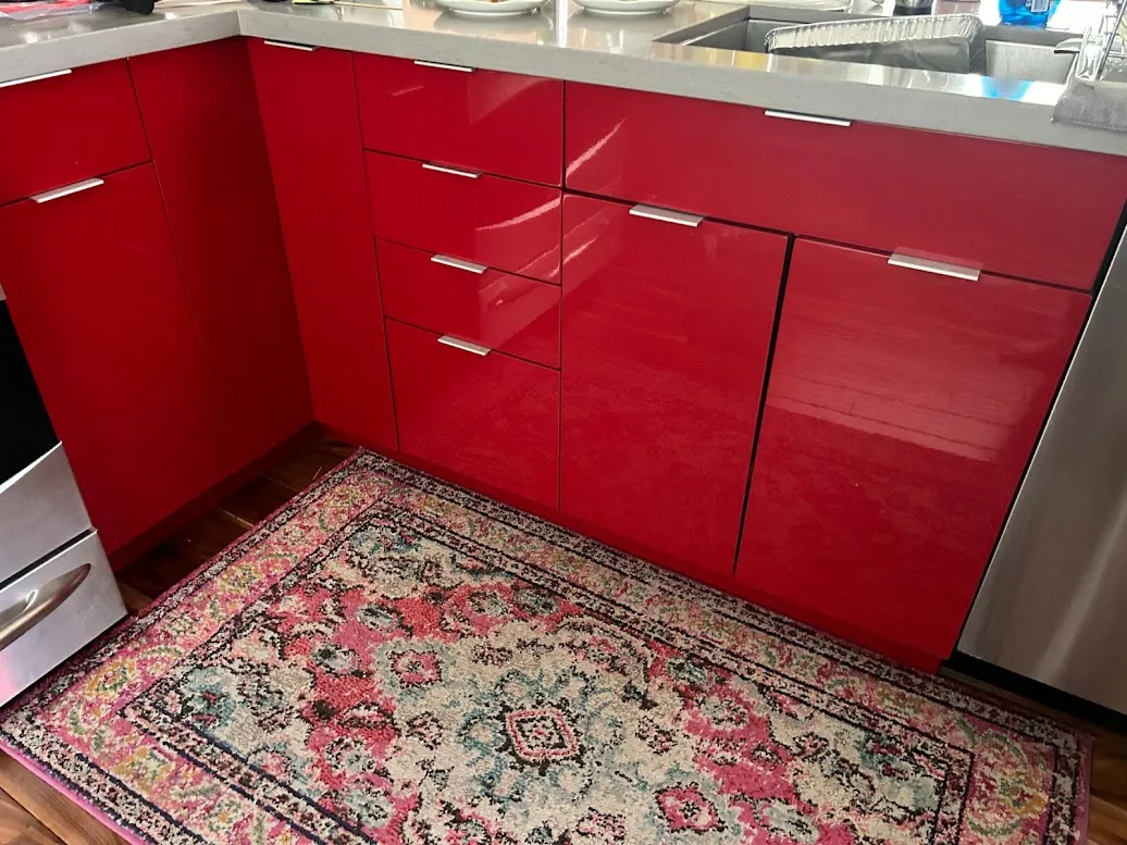 BEFORE: Glossy Red Kitchen Cabinets and Panels Awaiting Upgrade