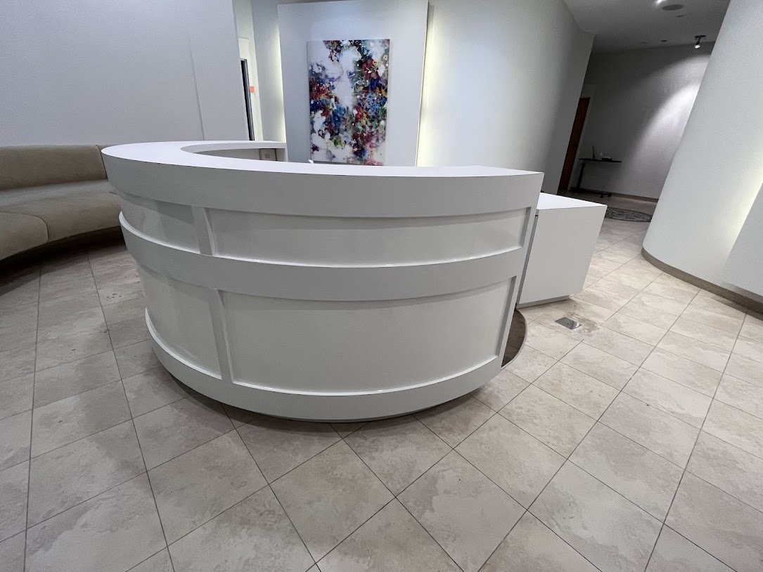 AFTER: Reception Desk Resurfaced in Matte White and Glossy White Finishes