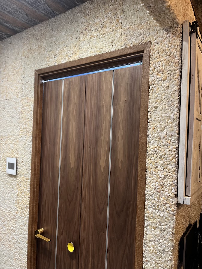 AFTER: Apartment Door Frames Resurfaced with a Chic Embossed Finish