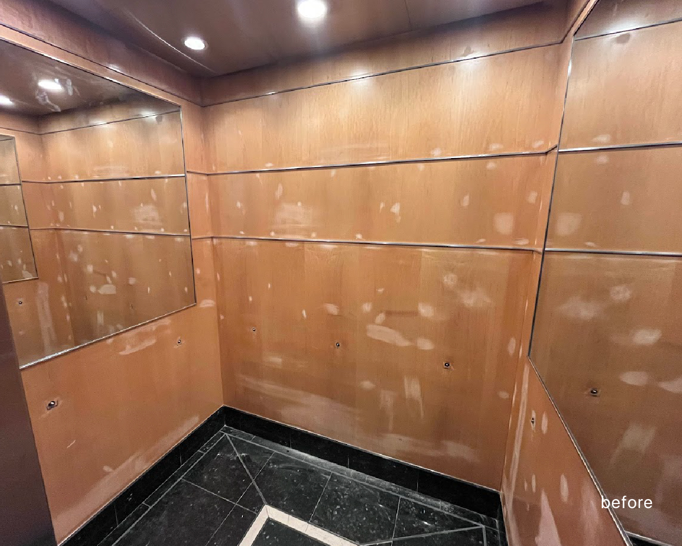 BEFORE: Damaged Elevator Panels Before Wrapping