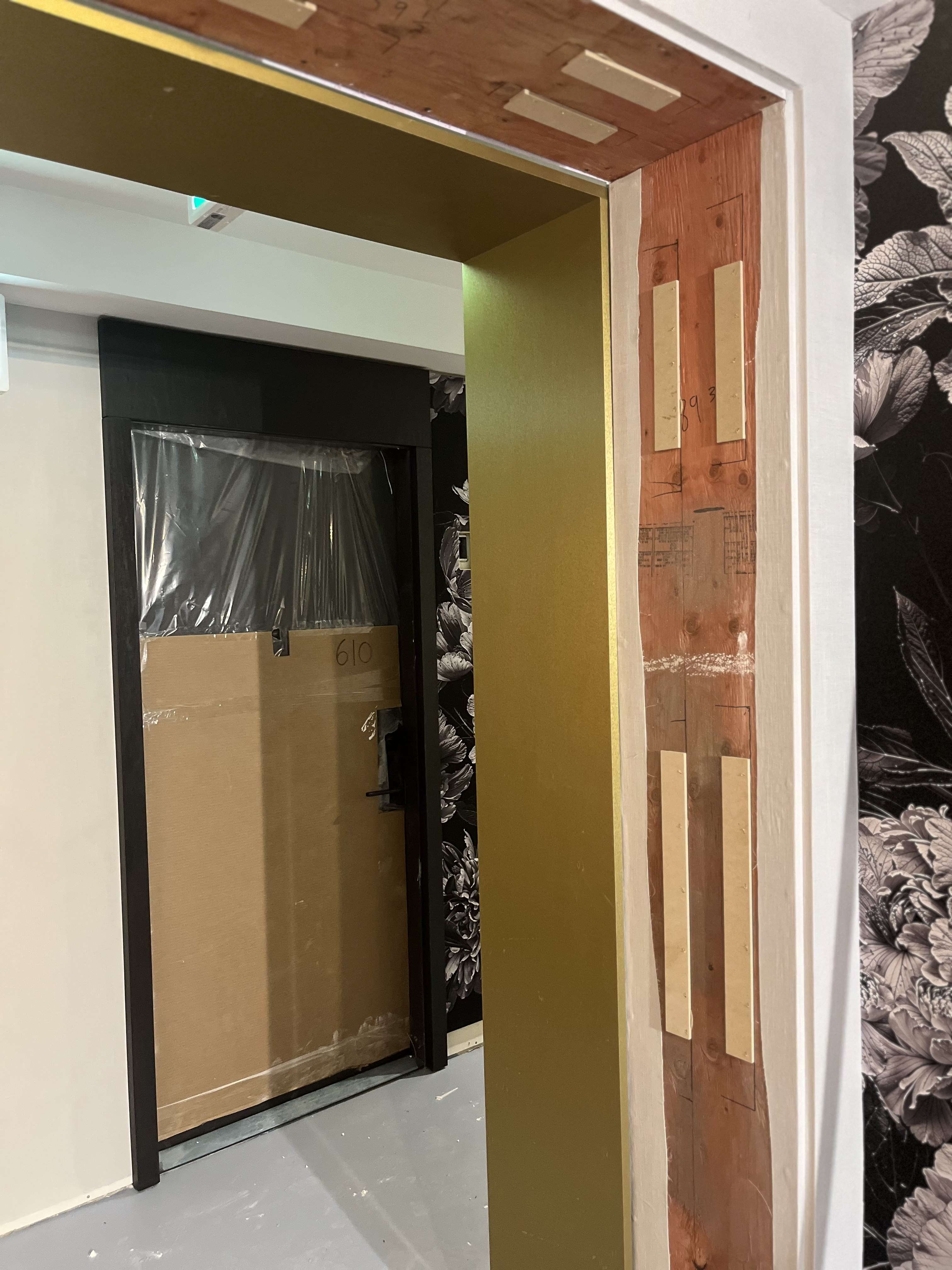 AFTER: Preconstruction Condo Panels Resurfaced With a Brass Finish