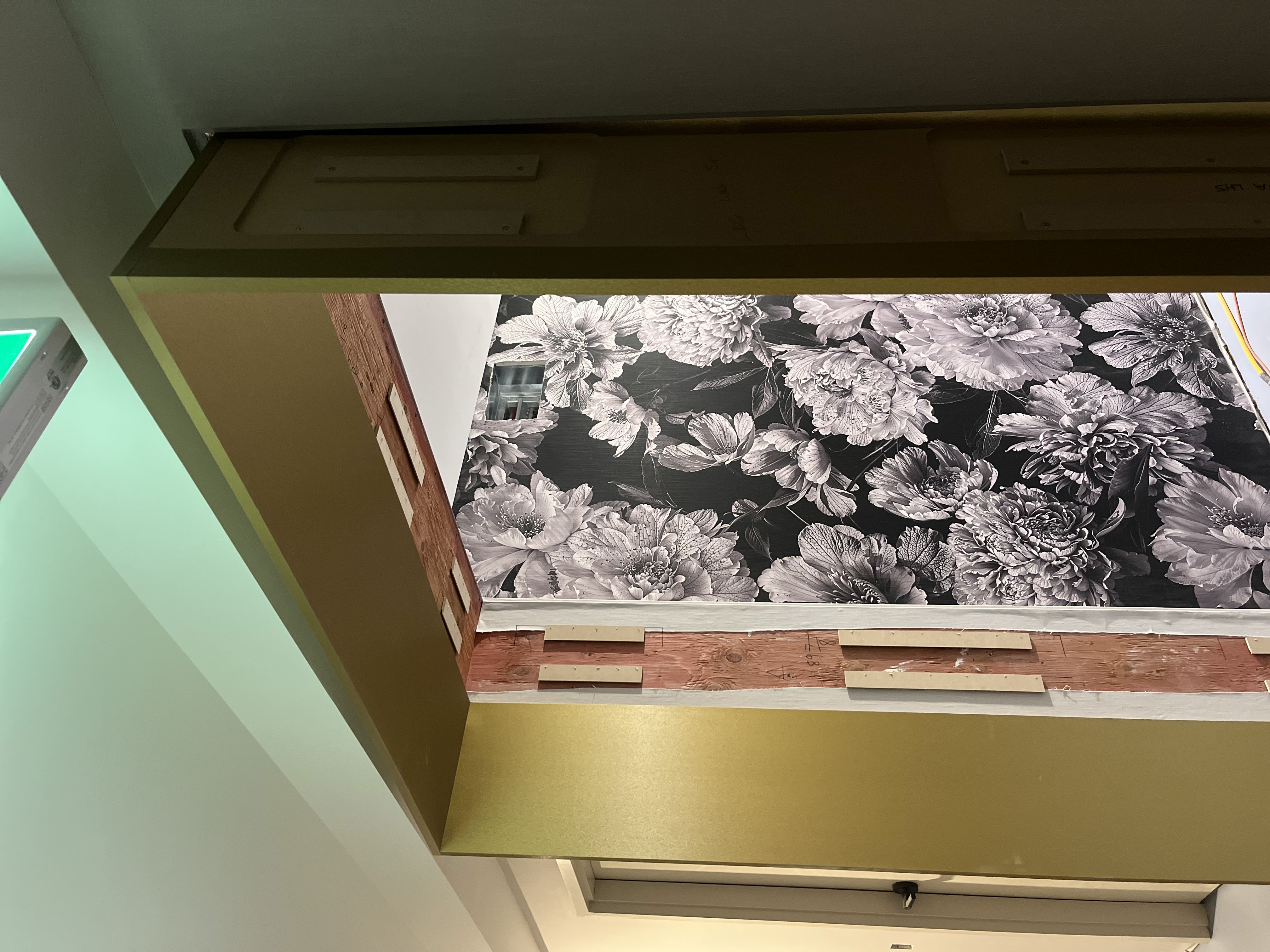 AFTER: Preconstruction Condo Panels Resurfaced With a Brass Finish