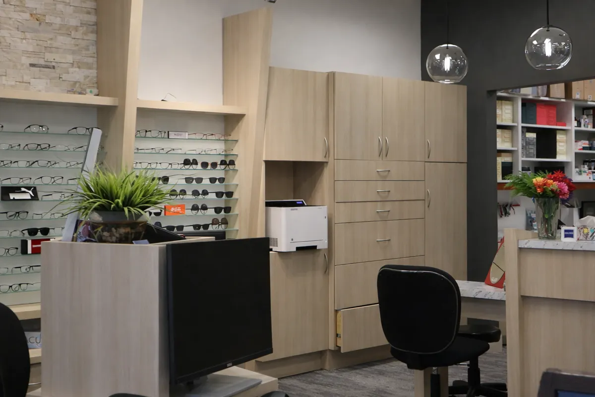 AFTER: Abbey Eye Care Retail Display Resurfaced in Light Wood Finish