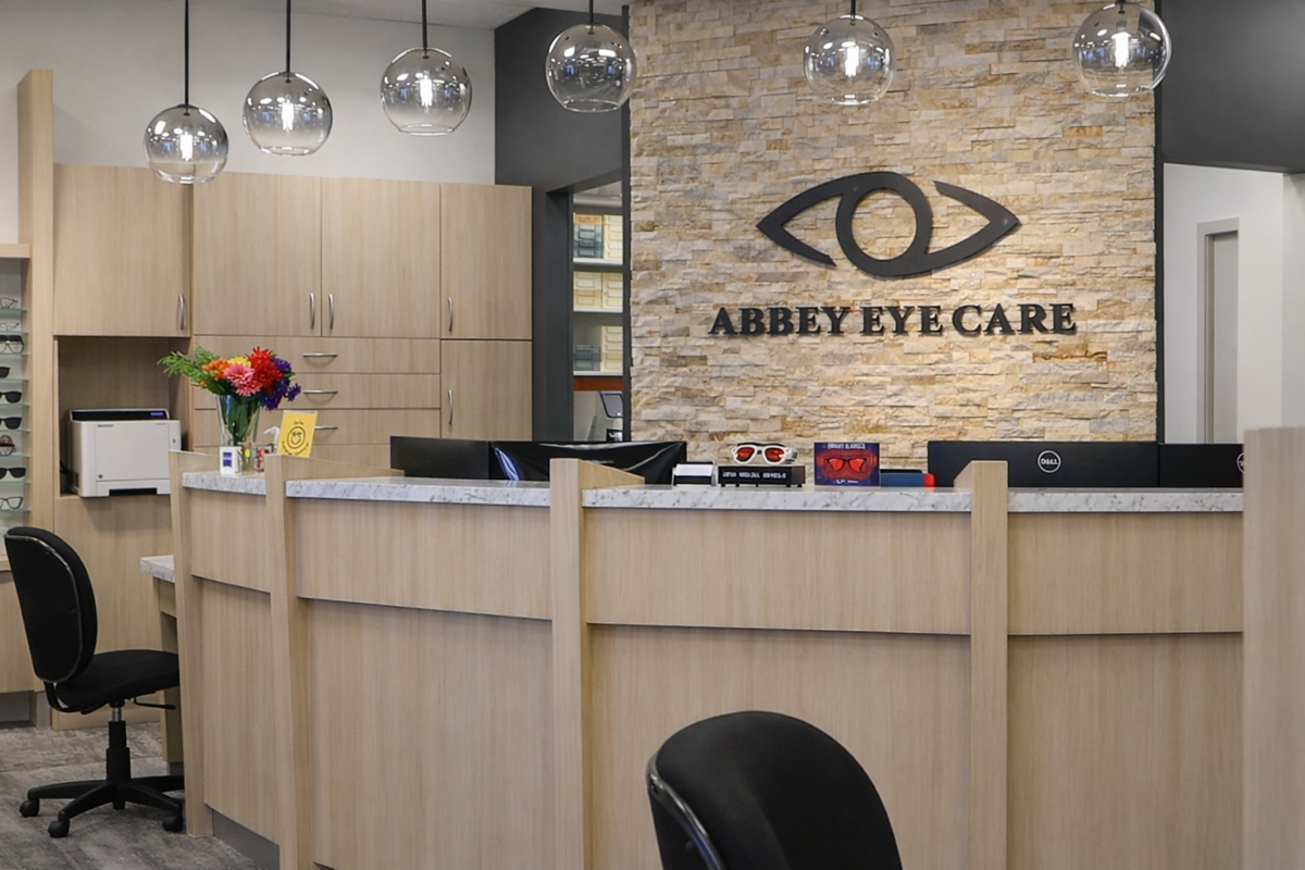 AFTER: Abbey Eye Care Retail Display Resurfaced in Light Wood Finish