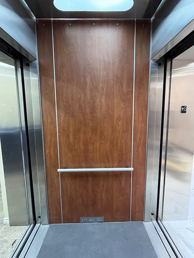 BEFORE: Elevator Cabin Panels to be Resurfaced