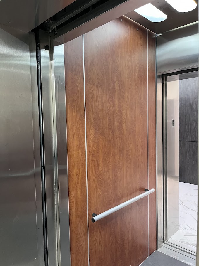 BEFORE: Elevator Cabin Panels to be Resurfaced