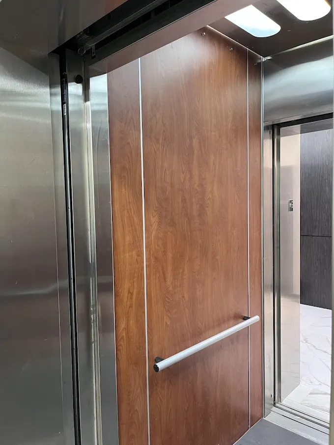 BEFORE: Elevator Cabin Panels to be Resurfaced