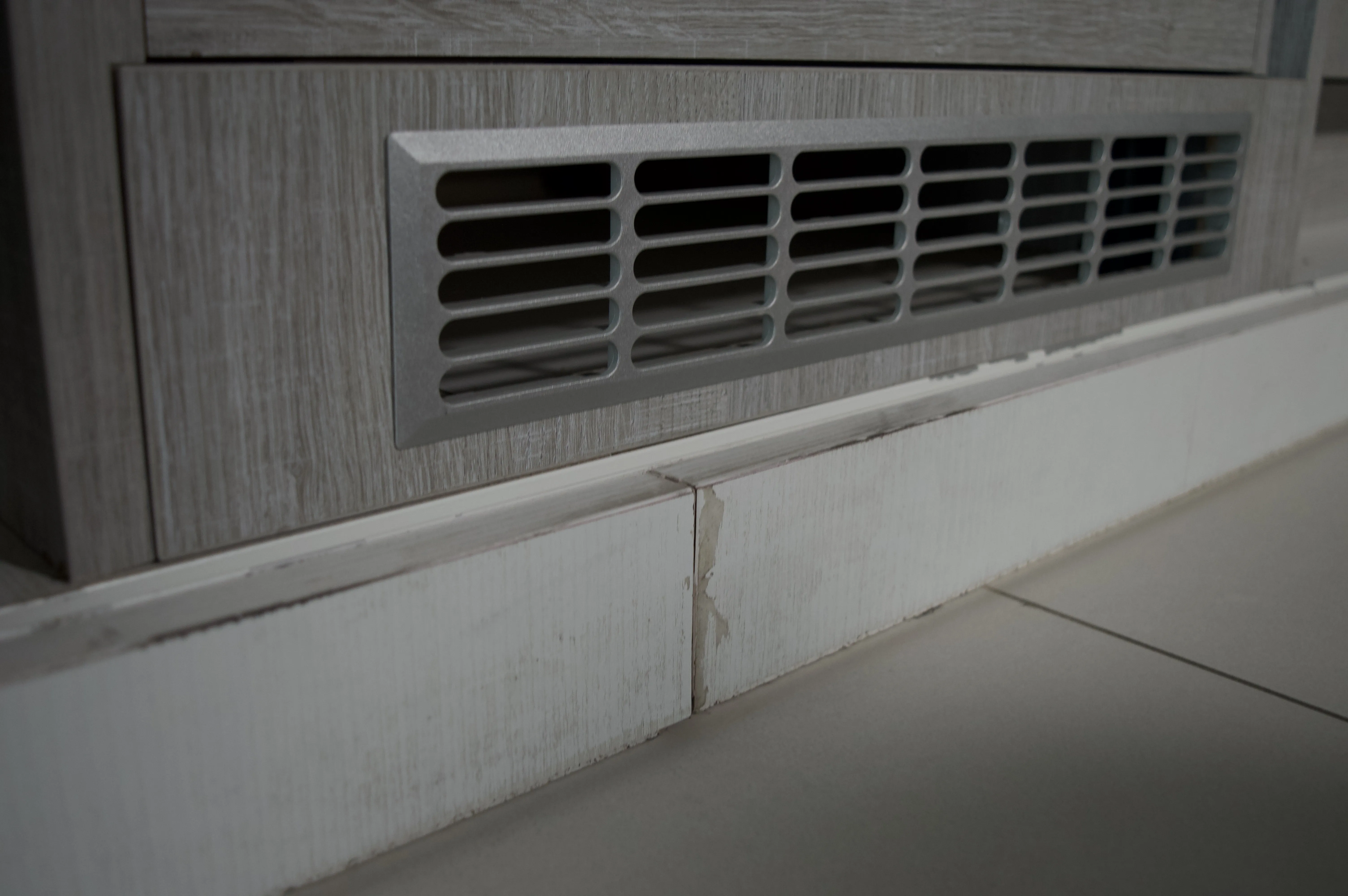 Before: Damaged Baseboards 