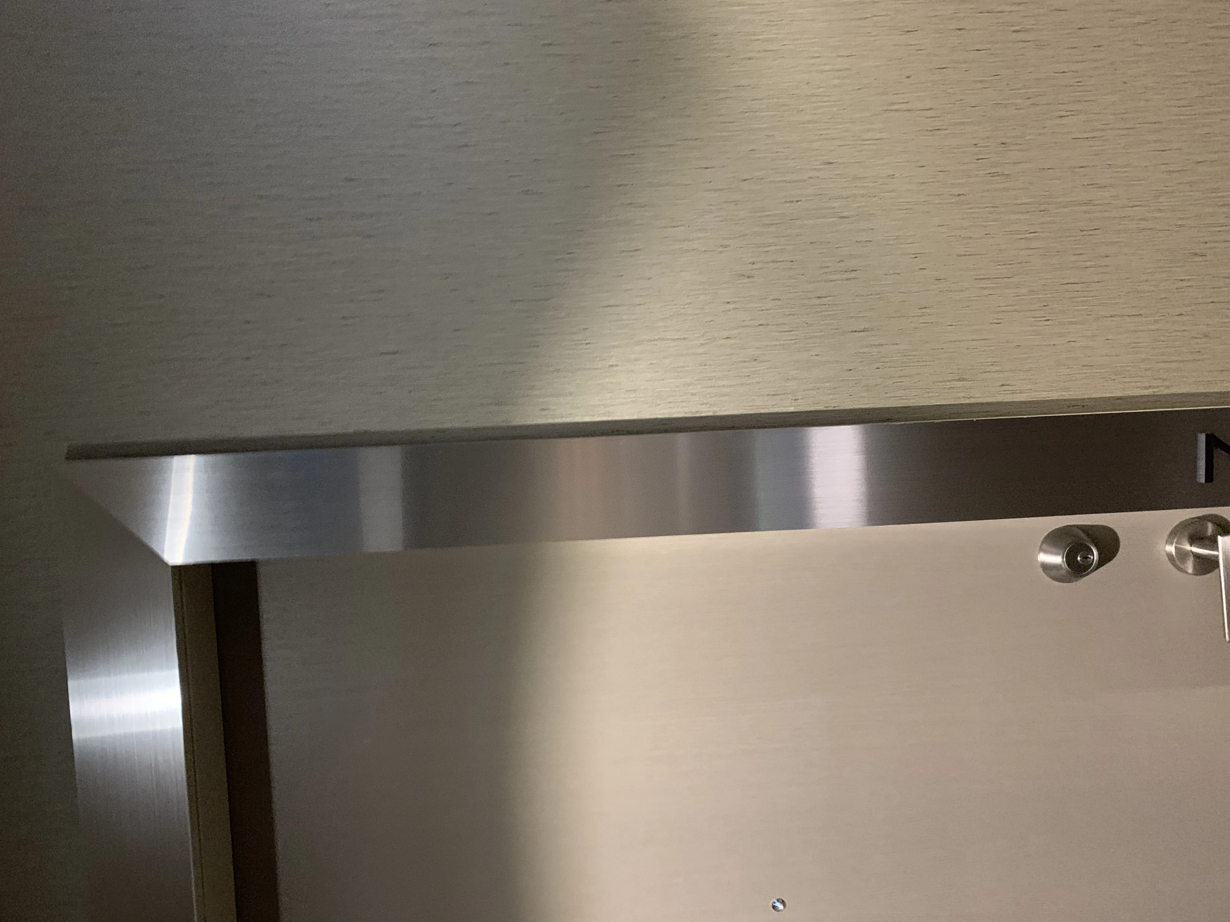 AFTER: Brushed Steel Door Surrounds